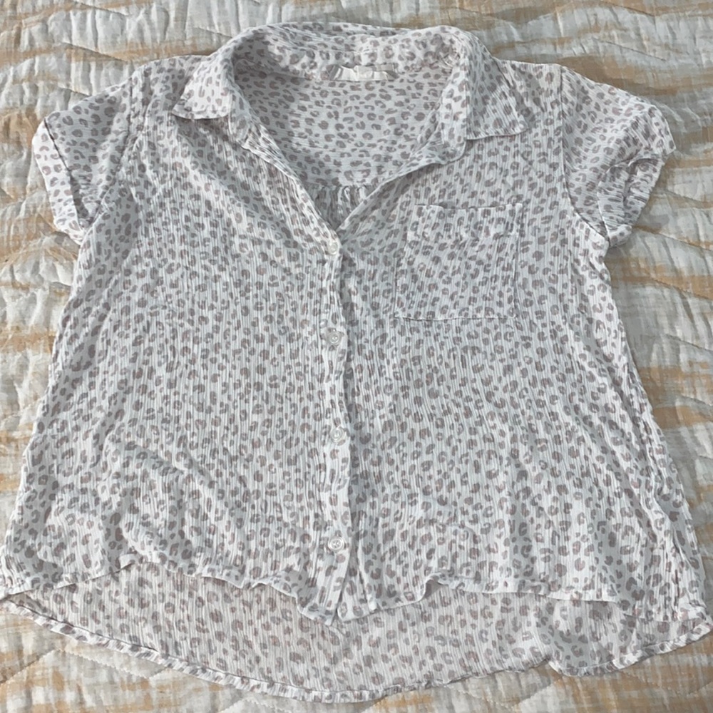 White cheetah print button up blouse